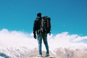 Modern travelers traveling on mountain